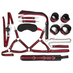 Черно-красный набор БДСМ: наручники, оковы, ошейник с поводком, кляп, маска, плеть, лиф